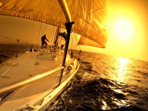 Sailing with yellow sunset